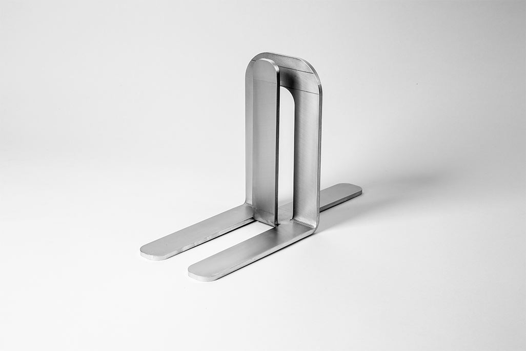 Close-up soni adjustable foot FIX Base on light gray background