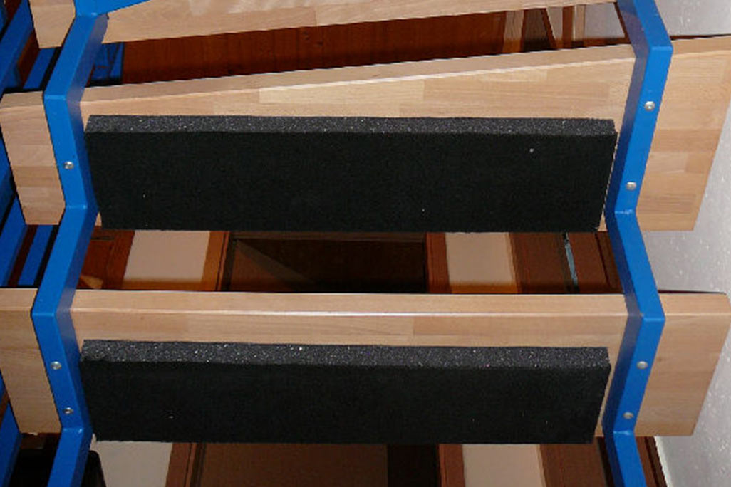 PUR foam panel with black fleece surface is fitted under steps
