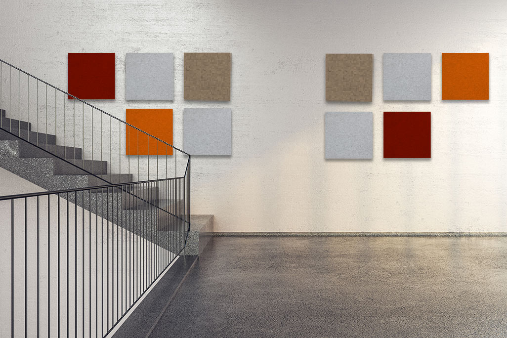 Clean, bright stairwell with square, colored acoustic elements on the wall.